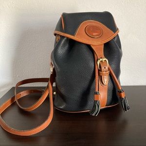 Dooney and Bourke small vintage black pebble leather backpack R712